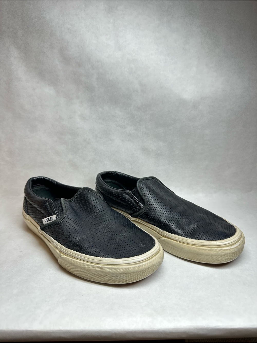 Vans Black Perforated Leather Slip-On Sneakers